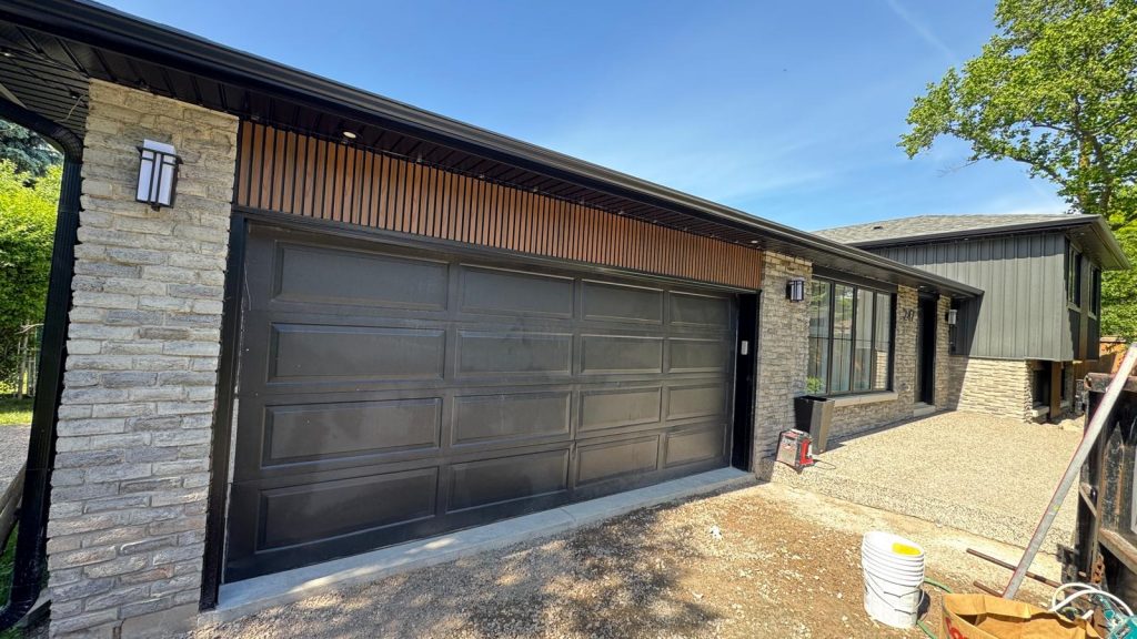 New garage door installation on a detached garage
