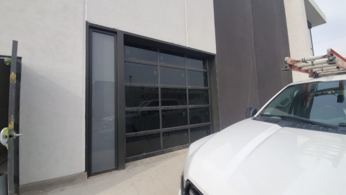Aluminum glass garage door installed by Pro Entry Services