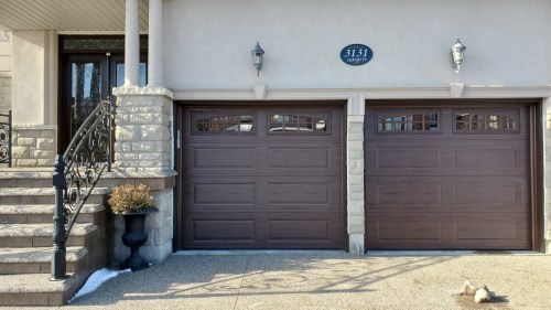 2 Single garage doors installed by Pro Entry Services