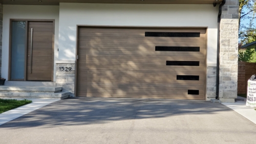 Modern-garage-door-with-horizontal-windows-Pro-Entry-Services